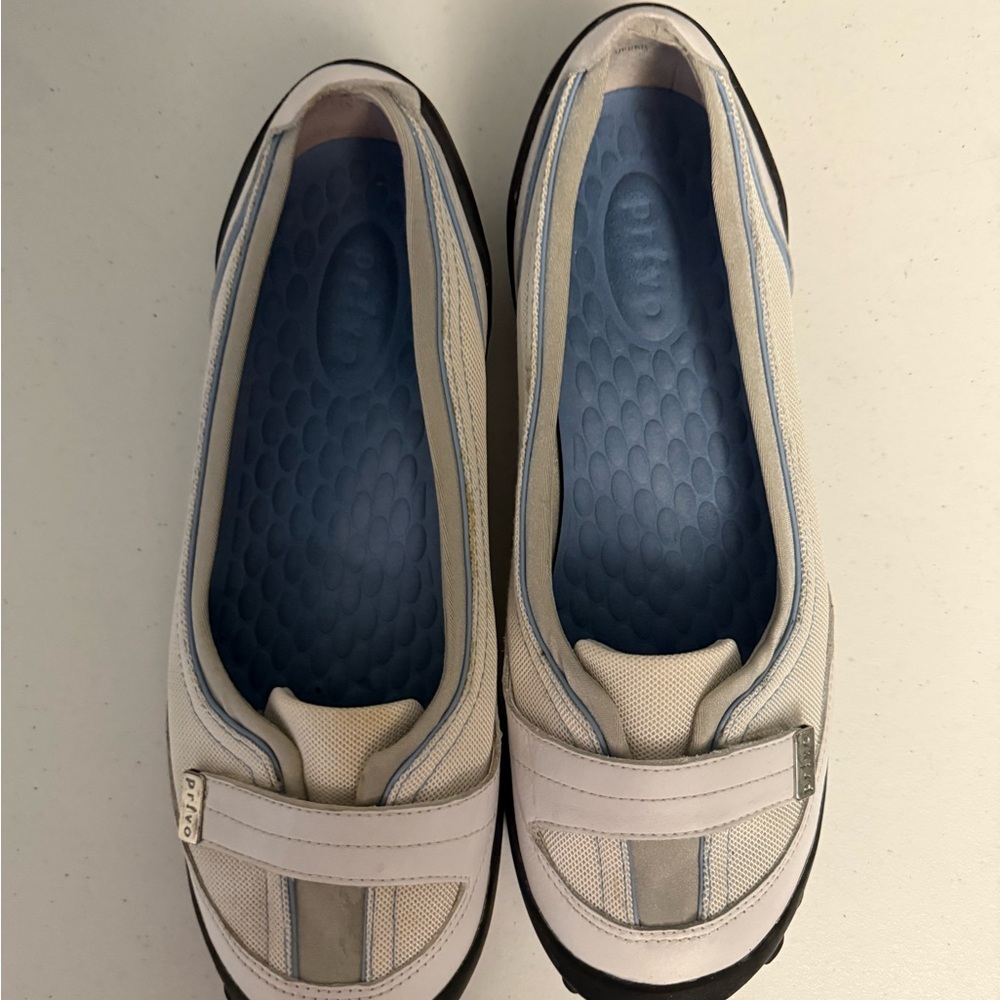 Clarks Women's white Slip-On Shoes